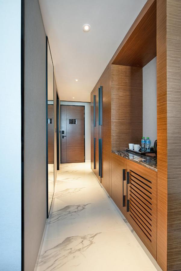 Asiana Grand Hotel Dubai Esterno foto A room at the hotel