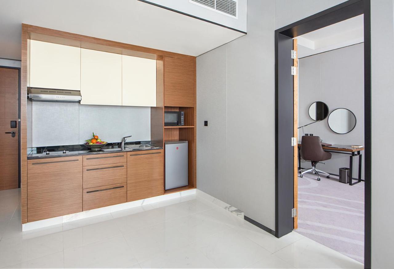 Asiana Grand Hotel Dubai Esterno foto A kitchenette in a hotel