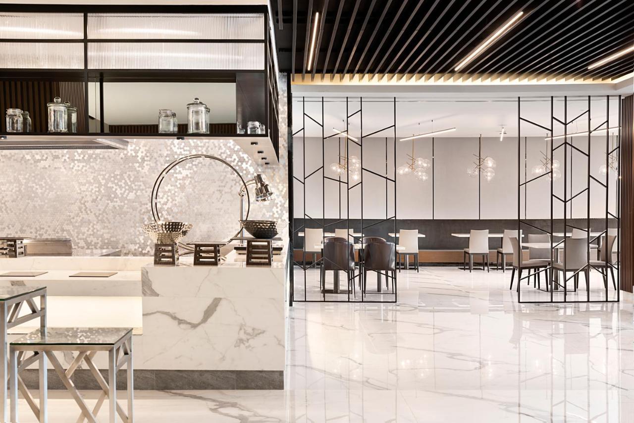 Asiana Grand Hotel Dubai Esterno foto The interior of the restaurant