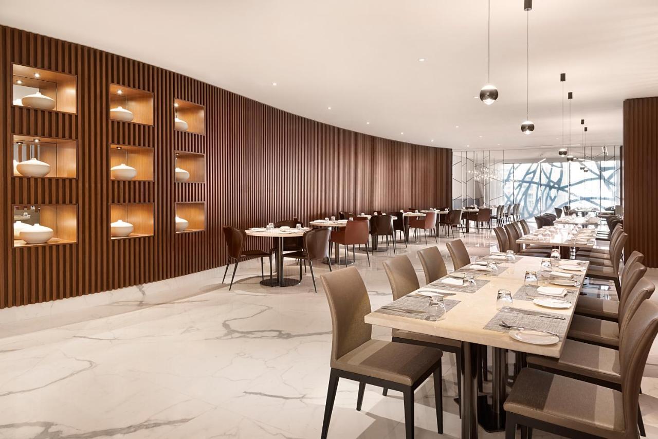 Asiana Grand Hotel Dubai Esterno foto The restaurant