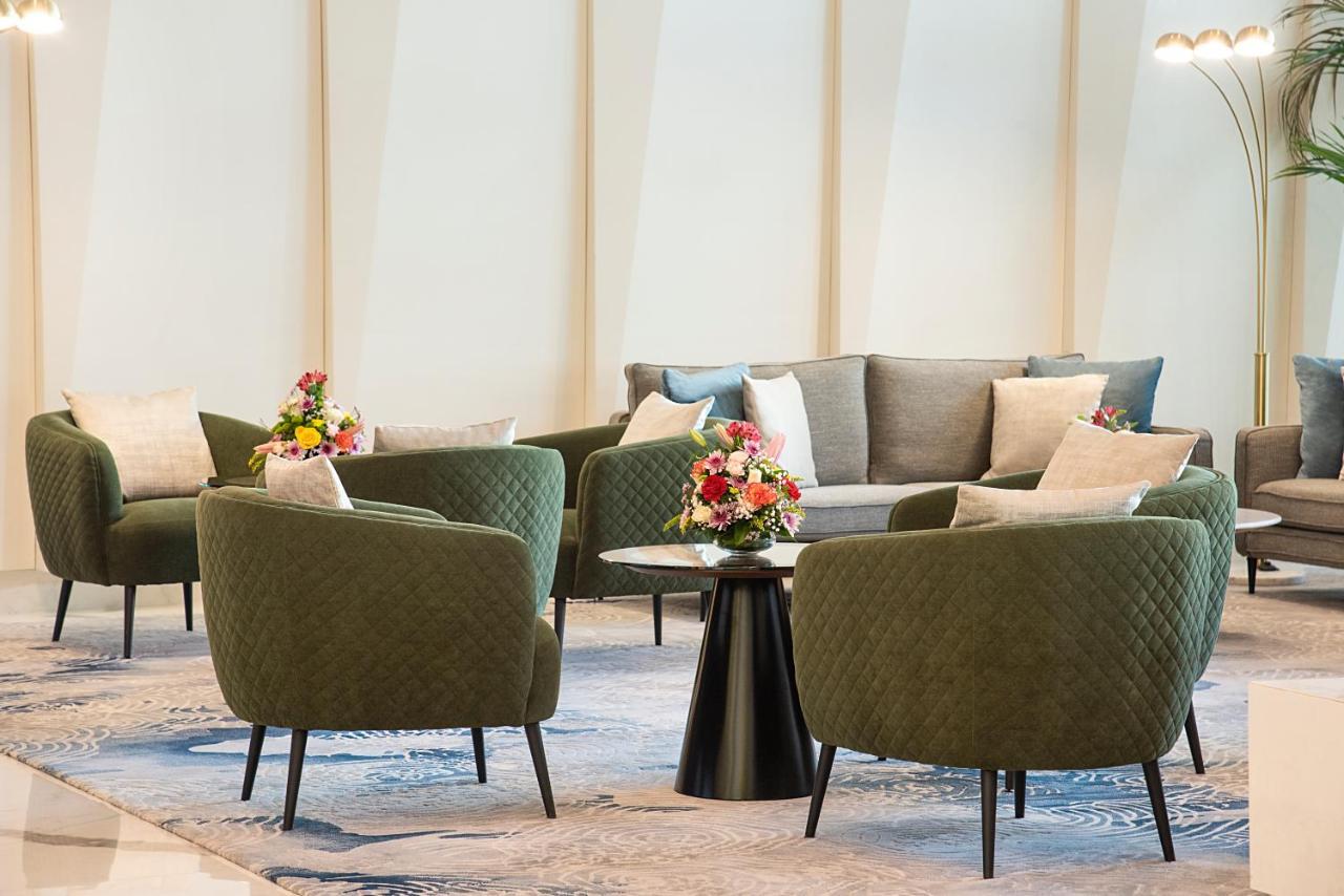 Asiana Grand Hotel Dubai Esterno foto The lounge at the airport